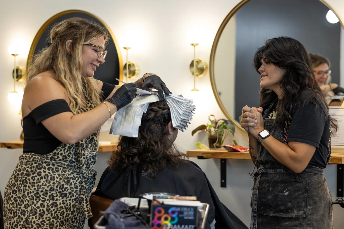 Maria Clara at work in The Salon